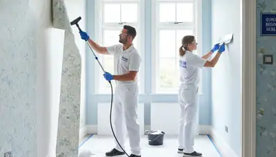 Professional wallpaper removal and wall prep by painters in Easton, PA before interior painting
